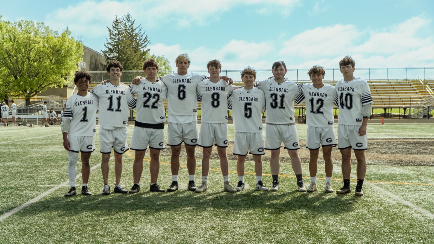 Seniors lined up on the field for senior day